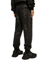 Jogging pants with embossed DG logo - | Dolce & Gabbana
