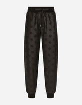 Jogging pants with embossed DG logo - | Dolce & Gabbana
