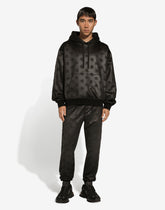 Jogging pants with embossed DG logo - | Dolce & Gabbana