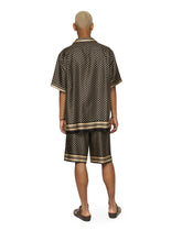 Silk twill jogging shorts with DG logo print - | Dolce & Gabbana