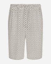 Crepe de chine jogging shorts with DG logo print - | Dolce & Gabbana