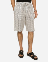 Crepe de chine jogging shorts with DG logo print - | Dolce & Gabbana