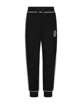 Jogging pants with heraldic DG logo - | Dolce & Gabbana