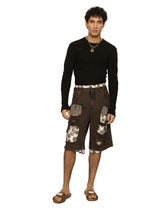 Denim shorts with rips - | Dolce & Gabbana