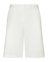 Stretch cotton Bermuda shorts with logo plaque - | Dolce & Gabbana