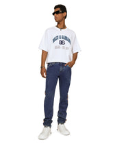 Light blue slim-fit jeans with branded bands - | Dolce & Gabbana