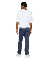 Light blue slim-fit jeans with branded bands - | Dolce & Gabbana