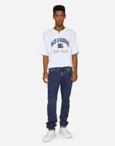 Light blue slim-fit jeans with branded bands - | Dolce & Gabbana