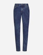 Light blue slim-fit jeans with branded bands - | Dolce & Gabbana