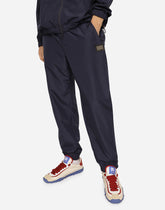 Nylon jogging pants with branded tag - | Dolce & Gabbana