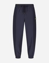 Nylon jogging pants with branded tag - | Dolce & Gabbana