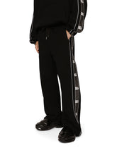 Jogging pants with branded side bands - | Dolce & Gabbana