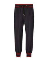 Pinstripe jogging pants with branded bands - | Dolce & Gabbana
