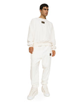 Terrycloth jogging pants with logo tag - | Dolce & Gabbana