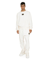 Terrycloth jogging pants with logo tag - | Dolce & Gabbana