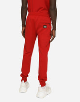 Jersey jogging pants with branded tag - | Dolce & Gabbana