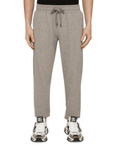 JERSEY JOGGING PANTS WITH FLOCKED DG LOGO - | Dolce & Gabbana