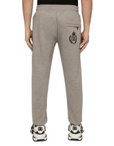 JERSEY JOGGING PANTS WITH FLOCKED DG LOGO - | Dolce & Gabbana