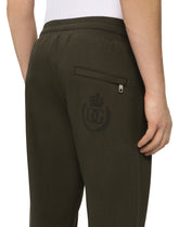 JERSEY JOGGING PANTS WITH FLOCKED DG LOGO - | Dolce & Gabbana