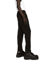 Pinstripe jersey jogging pants with DG patch - | Dolce & Gabbana