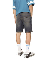 Stretch light blue wash denim shorts - | Dolce & Gabbana