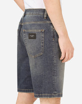 Stretch light blue wash denim shorts - | Dolce & Gabbana