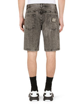 Gray slim-fit stretch jeans with rips - | Dolce & Gabbana