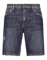 Blue denim shorts with rips and embroidery - | Dolce & Gabbana