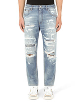 Loose light blue jeans with rips - | Dolce & Gabbana