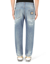 Loose light blue jeans with rips - | Dolce & Gabbana