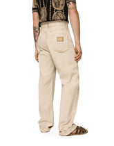 Overdyed jeans with raw hem details - | Dolce & Gabbana