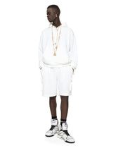 Jersey jogging shorts with embossed DG logo - | Dolce & Gabbana