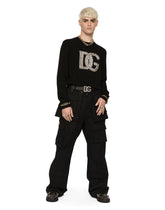 Round-neck cashmere sweater with DG logo and studs - | Dolce & Gabbana