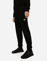 Jogging pants in wool and cashmere knit - | Dolce & Gabbana