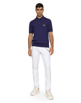 Wool polo-shirt with branded tag - | Dolce & Gabbana