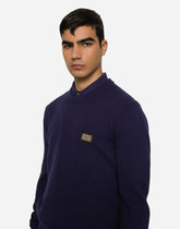 Wool round-neck sweater with branded tag - | Dolce & Gabbana