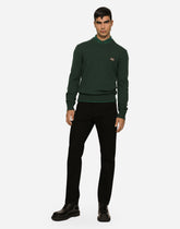 Wool round-neck sweater with branded tag - | Dolce & Gabbana
