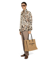 Linen round-neck sweater with branded tag - | Dolce & Gabbana