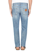 Light blue slim-fit stretch jeans with micro-rips - | Dolce & Gabbana
