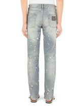 Slim-fit blue wash stretch jeans with abrasions - | Dolce & Gabbana