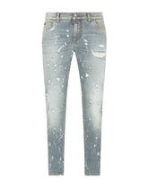 Slim-fit blue wash stretch jeans with abrasions - | Dolce & Gabbana