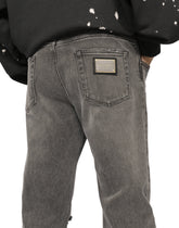 Gray slim-fit stretch jeans with rips - | Dolce & Gabbana