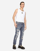 Mid blue slim-fit stretch jeans with rips - | Dolce & Gabbana