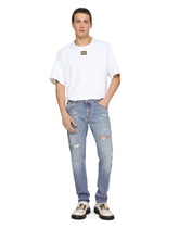 Light blue slim-fit stretch jeans with rips - | Dolce & Gabbana