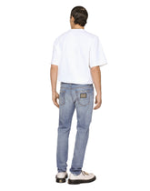 Light blue slim-fit stretch jeans with rips - | Dolce & Gabbana