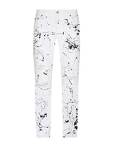 Slim-fit stretch jeans with rips and splash design - | Dolce & Gabbana