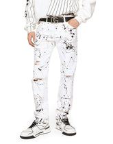 Slim-fit stretch jeans with rips and splash design - | Dolce & Gabbana