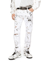 Slim-fit stretch jeans with rips and splash design - | Dolce & Gabbana