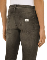 WASHED STRETCH DENIM SLIM JEANS - | Dolce & Gabbana