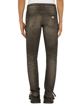 WASHED STRETCH DENIM SLIM JEANS - | Dolce & Gabbana